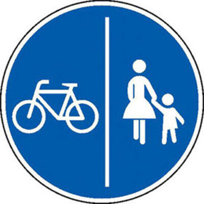 Getrennter Fuß und Radweg: Blaues rundes Schild, links Rad- rechts Fußgängersymbol